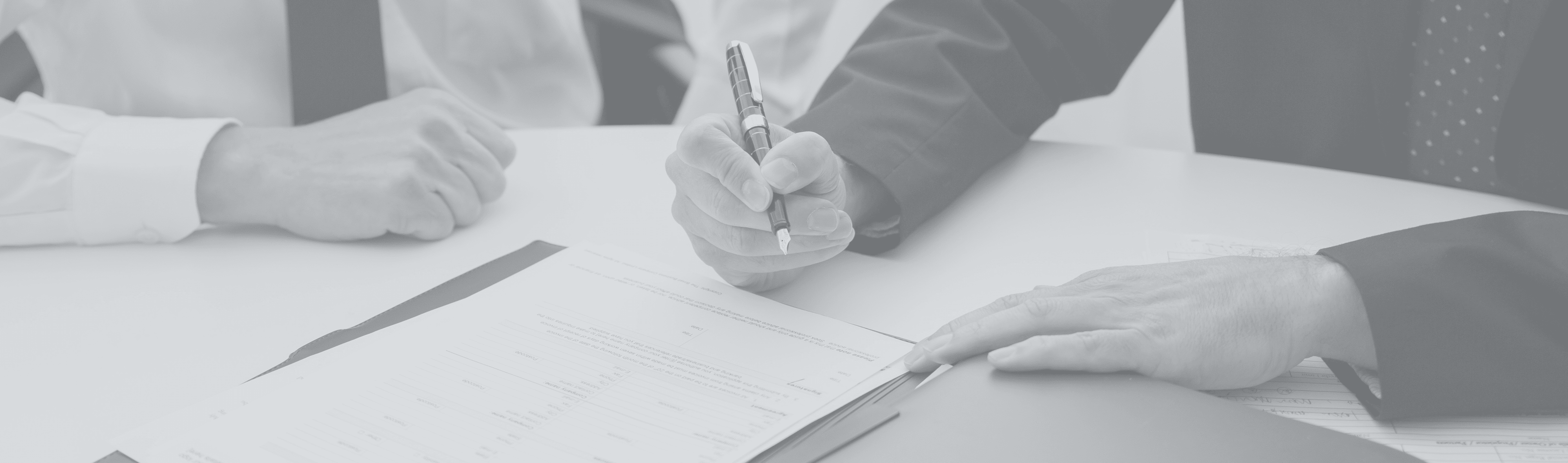 lawyer and client singing documents